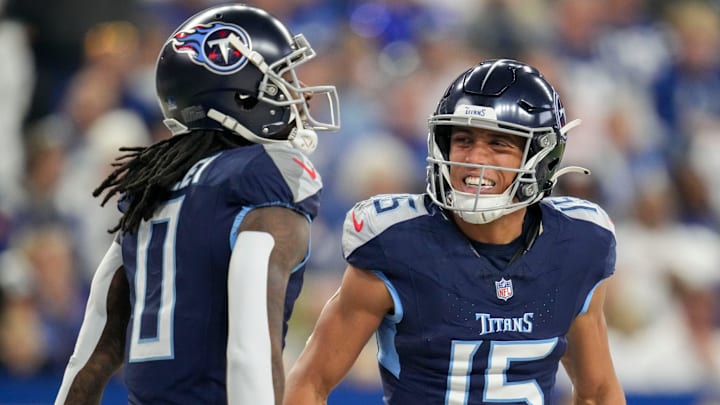 Tennessee Titans wide receiver Calvin Ridley (0) celebrates with Tennessee Titans wide receiver Nick Westbrook-Ikhine (15) after scoring a touchdown Sunday, Dec. 22, 2024, during a game against the Indianapolis Colts at Lucas Oil Stadium in Indianapolis.