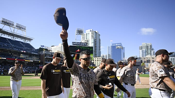 Sep 28, 2025; San Diego, California, USA; San Diego Padres second baseman Jose Iglesias (7) tips his cap to the fans after the Padres beat the Arizona Diamondbacks at Petco Park. 