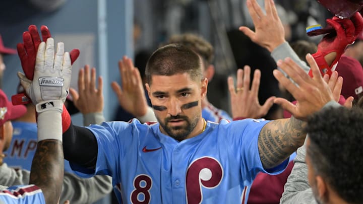 Oct 8, 2025; Los Angeles, California, USA; Philadelphia Phillies right fielder Nick Castellanos (8) celebrates after scoring a run during the eighth inning against the Los Angeles Dodgers during game three of the NLDS round for the 2025 MLB playoffs at Dodger Stadium. Mandatory Credit: Jayne Kamin-Oncea-Imagn Images