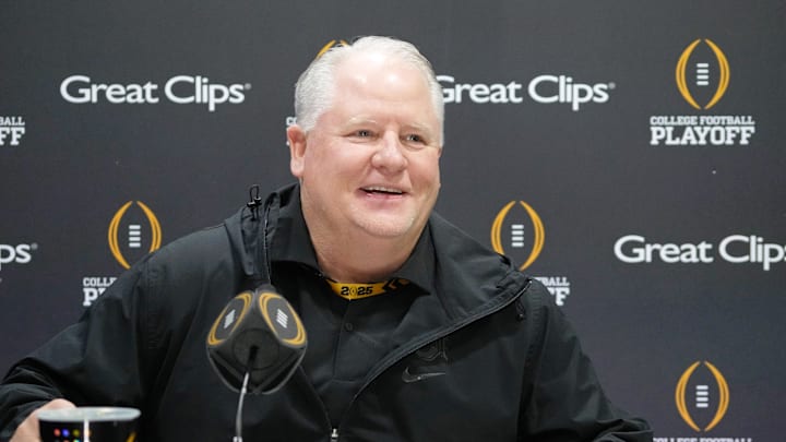 Ohio State offensive coordinator Chip Kelly smiles during 2025 CFP national championship media day.