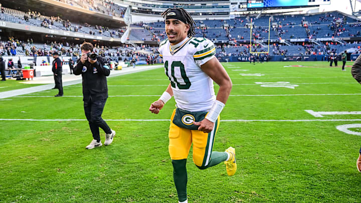 Nov 17, 2024; Chicago, Illinois, USA; Green Bay Packers quarterback Jordan Love (10) runs off the field after the game against the Chicago Bears at Soldier Field.