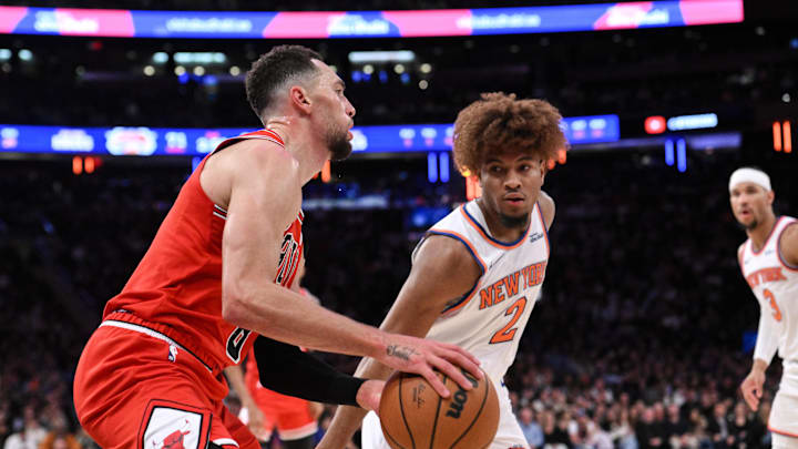 Nov 13, 2024; New York, New York, USA; Chicago Bulls guard Zach LaVine (8) looks to shoot the ball while being defended by New York Knicks guard Miles McBride (2) during the second half at Madison Square Garden. Mandatory Credit: John Jones-Imagn Images