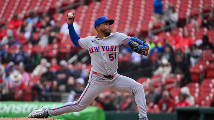 Apr 1, 2026; St. Louis, Missouri, USA; New York Mets starting pitcher Freddy Peralta (51) pitches against the St. Louis Cardinals during the third inning at Busch Stadium. Mandatory Credit: Jeff Curry-Imagn Images