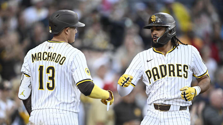 Jul 10, 2025; San Diego, California, USA; San Diego Padres right fielder Fernando Tatis Jr. (23) is congratulated by Manny Machado (13) after hitting a solo home run during the third inning against the Arizona Diamondbacks at Petco Park. Mandatory Credit: Denis Poroy-Imagn Images a Jul 10, 2025; San Diego, California, USA; San Diego Padres right fielder Fernando Tatis Jr. (23) is congratulated by Manny Machado (13) after hitting a solo home run during the third inning against the Arizona Diamondbacks at Petco Park. Mandatory Credit: Denis Poroy-Imagn Images a
