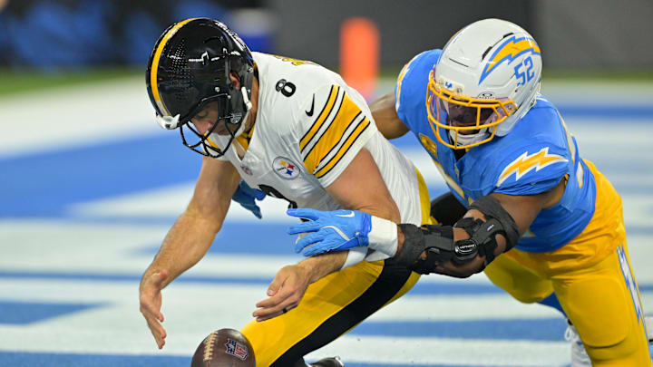 Nov 9, 2025; Inglewood, California, USA; Los Angeles Chargers linebacker Khalil Mack (52) sacks Pittsburgh Steelers quarterback Aaron Rodgers (8) for a safety during the first quarter of the game at SoFi Stadium. Mandatory Credit: Jayne Kamin-Oncea-Imagn Images