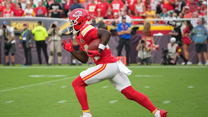 Sep 14, 2025; Kansas City, Missouri, USA; Kansas City Chiefs running back Brashard Smith (24) returns a kick against the Philadelphia Eagles during the game at GEHA Field at Arrowhead Stadium. Mandatory Credit: Denny Medley-Imagn Images