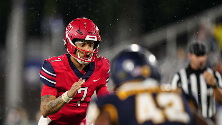 Dec 20, 2022; Boca Raton, Florida, USA; Liberty Flames quarterback Kaidon Salter (7) calls the snap