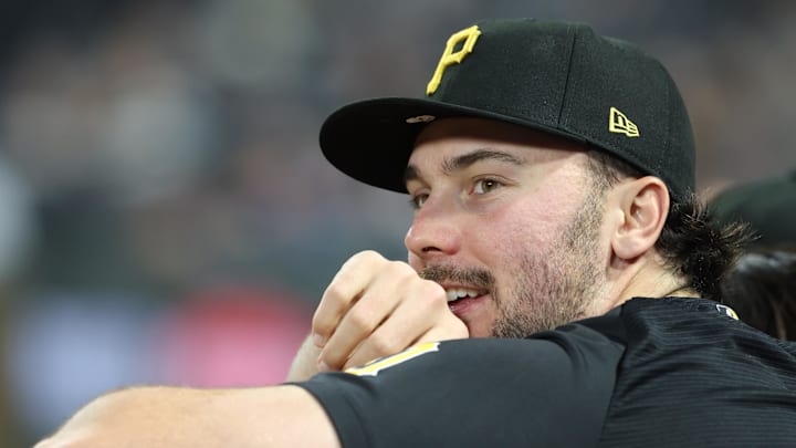 Apr 14, 2026; Pittsburgh, Pennsylvania, USA;  Pittsburgh Pirates pitcher Paul Skenes (30) watches game action from the dugout during the sixth inning against the Washington Nationals at PNC Park. Mandatory Credit: Charles LeClaire-Imagn Images