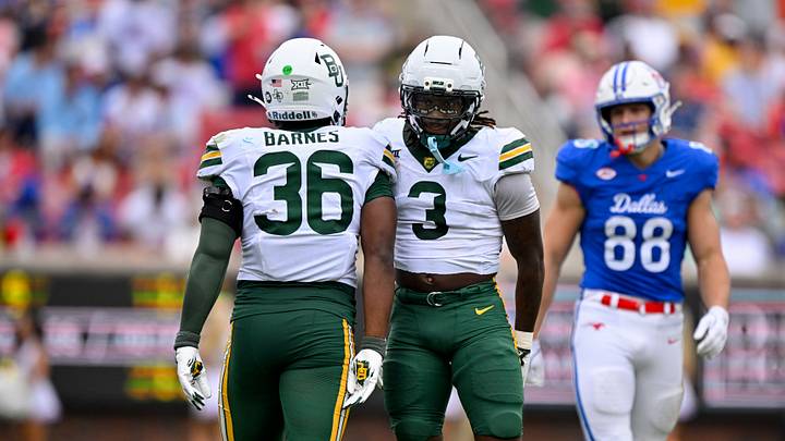 Sep 6, 2025; Dallas, Texas, USA; Baylor Bears linebacker Travion Barnes (36) and safety Devyn Bobby (3) look on during the game between the SMU Mustangs and the Baylor Bears at Gerald J. Ford Stadium. Mandatory Credit: Jerome Miron-Imagn Images Sep 6, 2025; Dallas, Texas, USA; Baylor Bears linebacker Travion Barnes (36) and safety Devyn Bobby (3) look on during the game between the SMU Mustangs and the Baylor Bears at Gerald J. Ford Stadium. Mandatory Credit: Jerome Miron-Imagn Images