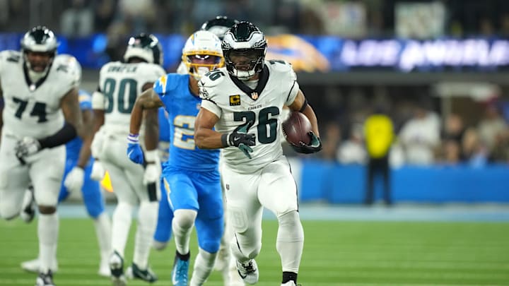 Dec 8, 2025; Inglewood, California, USA; Philadelphia Eagles running back Saquon Barkley (26) runs to score a touchdown against the Los Angeles Chargers in the second half at SoFi Stadium. Mandatory Credit: Kirby Lee-Imagn Images Dec 8, 2025; Inglewood, California, USA; Philadelphia Eagles running back Saquon Barkley (26) runs to score a touchdown against the Los Angeles Chargers in the second half at SoFi Stadium. Mandatory Credit: Kirby Lee-Imagn Images