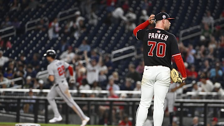 Sep 15, 2025; Washington, District of Columbia, USA; Washington Nationals starting pitcher Mitchell Parker (70) reacts after giving up a three run home run to Atlanta Braves first baseman Matt Olson (28) during the fifth inning at Nationals Park. Sep 15, 2025; Washington, District of Columbia, USA; Washington Nationals starting pitcher Mitchell Parker (70) reacts after giving up a three run home run to Atlanta Braves first baseman Matt Olson (28) during the fifth inning at Nationals Park.