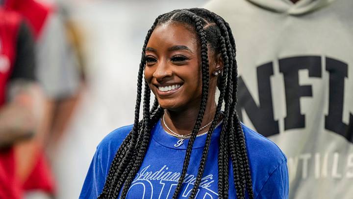 Simone Biles, wife of Indianapolis Colts safety Jonathan Owens (38), walks on the sideline on Saturday, Aug. 29, 2026, ahead of the game against the Detroit Lions at Lucas Oil Stadium in Indianapolis. Simone Biles, wife of Indianapolis Colts safety Jonathan Owens (38), walks on the sideline on Saturday, Aug. 29, 2026, ahead of the game against the Detroit Lions at Lucas Oil Stadium in Indianapolis.