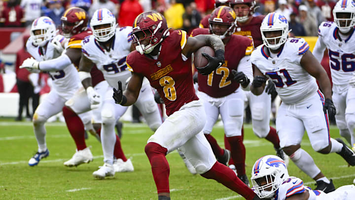 Sep 24, 2023; Landover, Maryland, USA; Washington Commanders running back Brian Robinson Jr. (8)