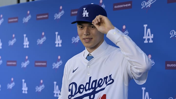 Los Angeles Dodgers pitcher Roki Sasaki at his introductory press conference. Los Angeles Dodgers pitcher Roki Sasaki at his introductory press conference.