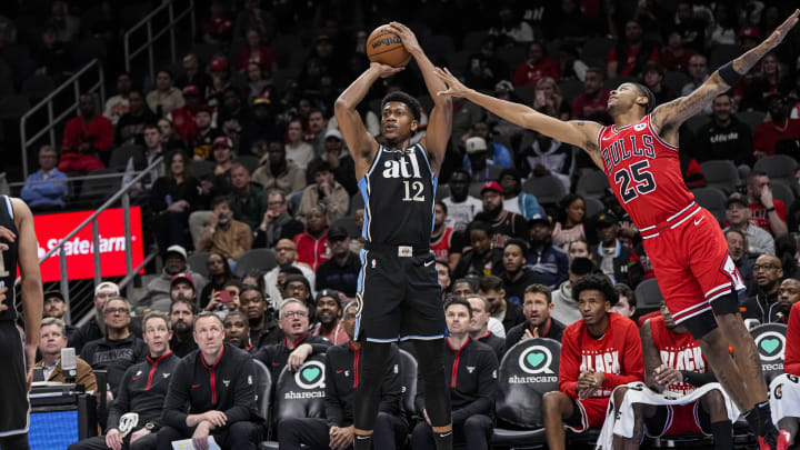 Feb 12, 2024; Atlanta, Georgia, USA; Atlanta Hawks forward De'Andre Hunter (12) shoots against