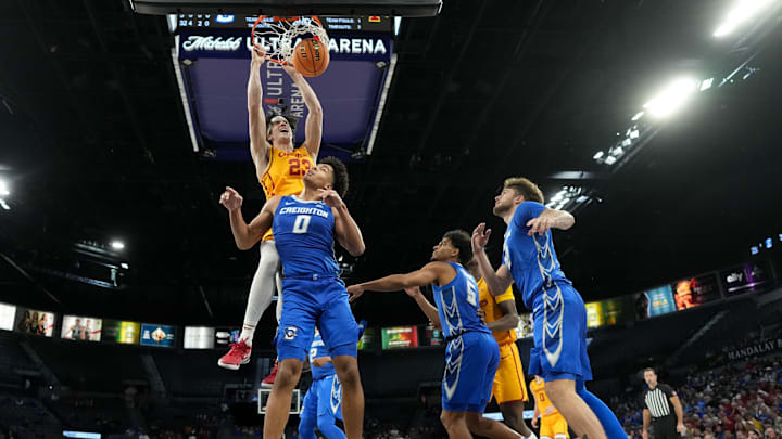 Nov 25, 2025; Las Vegas, Nevada, USA; Iowa State Cyclones forward Blake Buchanan (23) dunks the ball over Creighton Bluejays forward Jasen Green (0) during the second half in a 2025 Players Era Festival group play game at Michelob Ultra Arena. Mandatory Credit: Kirby Lee-Imagn Images Nov 25, 2025; Las Vegas, Nevada, USA; Iowa State Cyclones forward Blake Buchanan (23) dunks the ball over Creighton Bluejays forward Jasen Green (0) during the second half in a 2025 Players Era Festival group play game at Michelob Ultra Arena. Mandatory Credit: Kirby Lee-Imagn Images