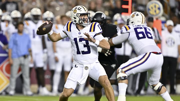 Oct 26, 2024; College Station, Texas, USA; LSU Tigers quarterback Garrett Nussmeier (13) looks to pass the ball in the first quarter against the Texas A&M Aggies. The Aggies defeated the Tigers 38-23; at Kyle Field. Mandatory Credit: Maria Lysaker-Imagn Images.  