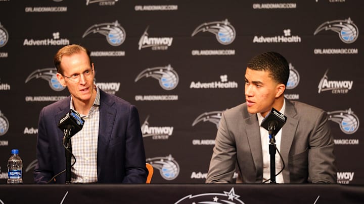 Orlando Magic president of basketball operations Jeff Weltman (left) and second round draft pick Caleb Houstan (right) during a press conference at the Amway Center. Orlando Magic president of basketball operations Jeff Weltman (left) and second round draft pick Caleb Houstan (right) during a press conference at the Amway Center.