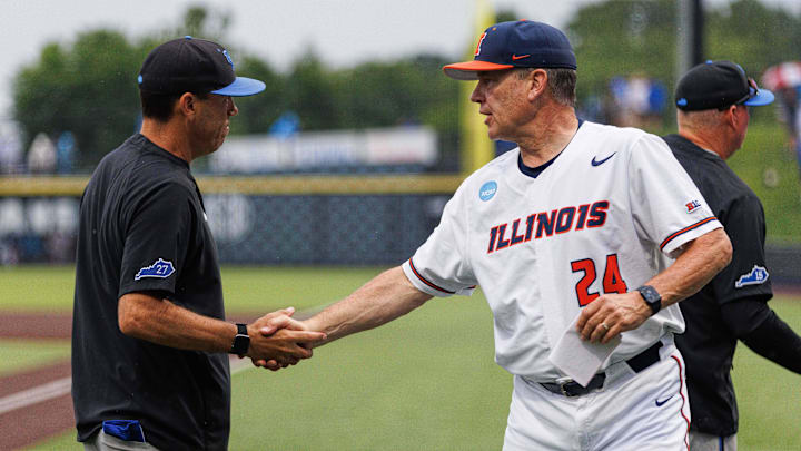 Jun 1, 2024; Lexington, KY, USA; Kentucky Wildcats head coach Nick Mingione shakes hands with Illinois Fighting Illini head coach Dan Hartleb after the game at Kentucky Proud Park. Mandatory Credit: Jordan Prather-Imagn Images Jun 1, 2024; Lexington, KY, USA; Kentucky Wildcats head coach Nick Mingione shakes hands with Illinois Fighting Illini head coach Dan Hartleb after the game at Kentucky Proud Park. Mandatory Credit: Jordan Prather-Imagn Images