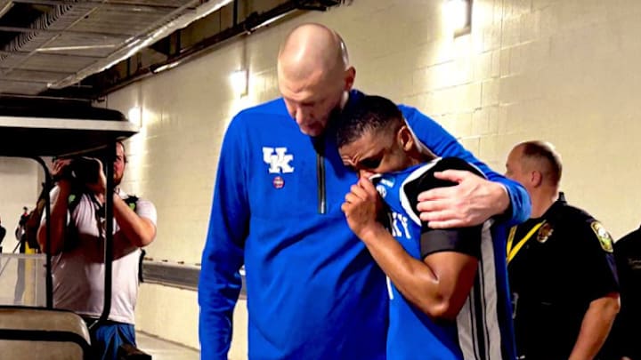 Pope and Butler embrace. Pope and Butler embrace.