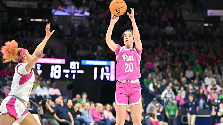 Feb 4, 2024; South Bend, Indiana, USA; Pittsburgh Panthers guard Aislin Malcolm (20) shoots as Notre Dame Fighting Irish guard Hannah Hidalgo (3) defends in the first half at the Purcell Pavilion. Mandatory Credit: Matt Cashore-Imagn Images