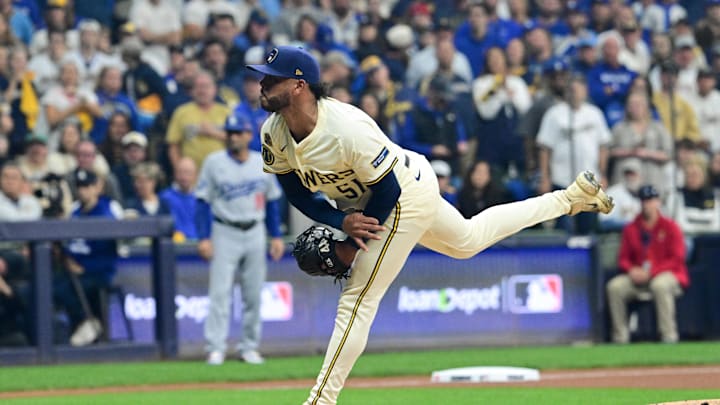 Oct 14, 2025; Milwaukee, Wisconsin, USA; Milwaukee Brewers pitcher Freddy Peralta (51) throws a pitch against the Los Angeles Dodgers in the first inning during game two of the NLCS round for the 2025 MLB playoffs at American Family Field. Mandatory Credit: Benny Sieu-Imagn Images