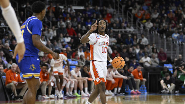 Mar 20, 2025; Providence, RI, USA; Clemson Tigers guard Del Jones (10) controls the ball against the McNeese State Cowboys during the first half at Amica Mutual Pavilion. Mandatory Credit: Eric Canha-Imagn Images