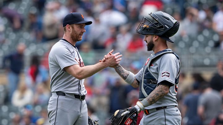 Apr 12, 2025; Minneapolis, Minnesota, USA; Detroit Tigers relief pitcher John Brebbia (49) and catcher Tomas Nido (50) celebrate after defeating the Minnesota Twins at Target Field. Mandatory Credit: Jordan Johnson-Imagn Images