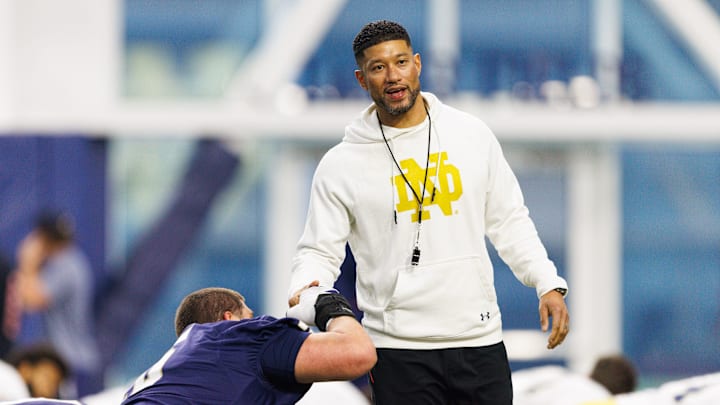 Head coach Marcus Freeman greets his players during a Notre Dame football practice at Irish Athletic Center on Friday, March 20, 2026, in South Bend.