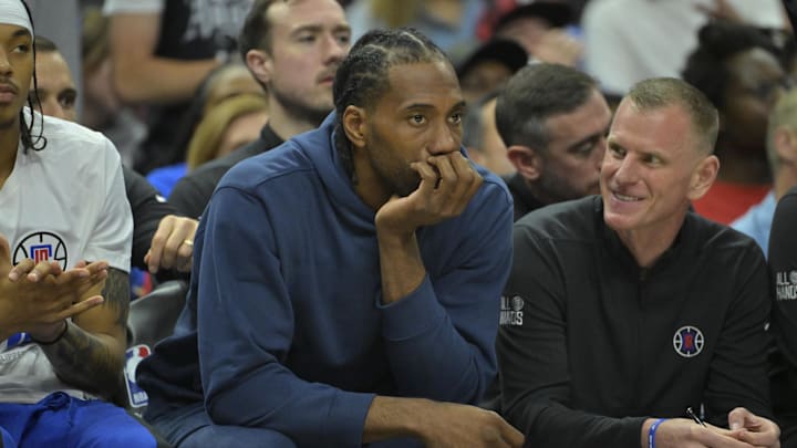 Los Angeles Clippers forward Kawhi Leonard (2) looks on from the bench during the 2024 NBA playoffs. Los Angeles Clippers forward Kawhi Leonard (2) looks on from the bench during the 2024 NBA playoffs.