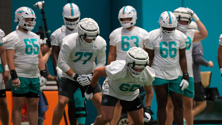 Miami Dolphins center Andrew Meyer (60) works during training camp at Baptist Health Training Complex. Miami Dolphins center Andrew Meyer (60) works during training camp at Baptist Health Training Complex.