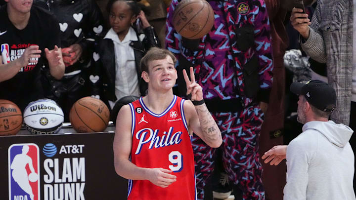 Feb 18, 2023; Salt Lake City, UT, USA; Philadelphia 76ers guard Mac McClung (9) reacts in the Dunk Contest during the 2023 All Star Saturday Night at Vivint Arena. Mandatory Credit: Kirby Lee-Imagn Images