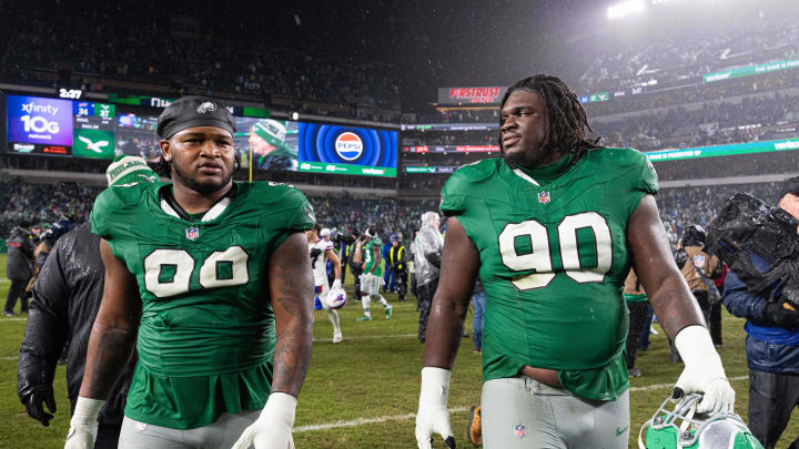 Eagles defensive tackle Jordan Davis (90) and defensive tackle Jalen Carter (98) walk off the field after a victory against the Buffalo Bills at Lincoln Financial Field. Eagles defensive tackle Jordan Davis (90) and defensive tackle Jalen Carter (98) walk off the field after a victory against the Buffalo Bills at Lincoln Financial Field.