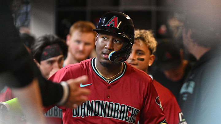 Sep 20, 2024; Milwaukee, Wisconsin, USA; Arizona Diamondbacks shortstop Geraldo Perdomo (2) celebrates in the dugout after hitting a home run against the Milwaukee Brewers in the fifth inning at American Family Field. Mandatory Credit: Michael McLoone-Imagn Images Sep 20, 2024; Milwaukee, Wisconsin, USA; Arizona Diamondbacks shortstop Geraldo Perdomo (2) celebrates in the dugout after hitting a home run against the Milwaukee Brewers in the fifth inning at American Family Field. Mandatory Credit: Michael McLoone-Imagn Images