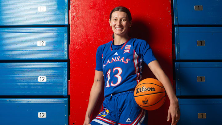 Kansas super-senior guard Holly Kersgieter (13) poses during media day inside Allen Fieldhouse