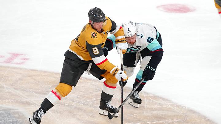 Apr 15, 2026; Las Vegas, Nevada, USA; Vegas Golden Knights center Jack Eichel (9) keeps the puck away from Seattle Kraken defenseman Adam Larsson (6) during the third period at T-Mobile Arena. Mandatory Credit: Stephen R. Sylvanie-Imagn Images Apr 15, 2026; Las Vegas, Nevada, USA; Vegas Golden Knights center Jack Eichel (9) keeps the puck away from Seattle Kraken defenseman Adam Larsson (6) during the third period at T-Mobile Arena. Mandatory Credit: Stephen R. Sylvanie-Imagn Images