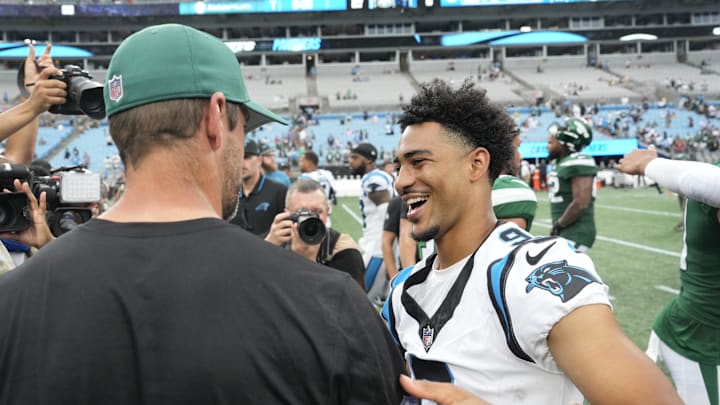 Aug 12, 2023; Charlotte, North Carolina, USA;  Carolina Panthers quarterback Bryce Young (9) with New York Jets quarterback Aaron Rodgers (8) after the game at Bank of America Stadium. Bob Donnan-USA TODAY Sports