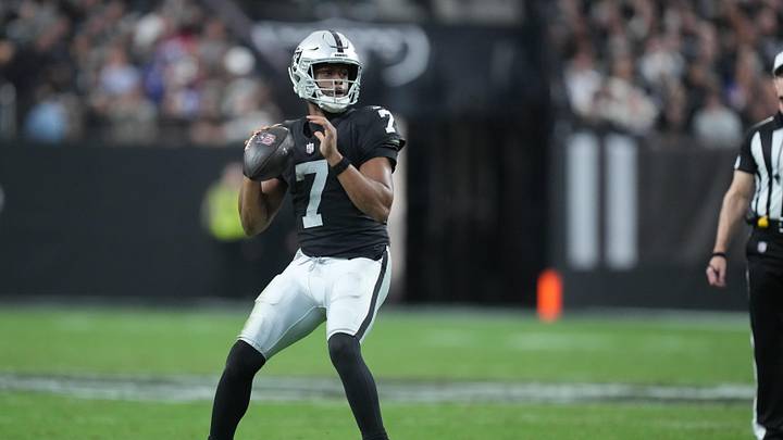 Dec 28, 2025; Paradise, Nevada, USA; Las Vegas Raiders quarterback Geno Smith (7) looks to throw in the third quarter against the New York Giants at Allegiant Stadium. Mandatory Credit: Kirby Lee-Imagn Images