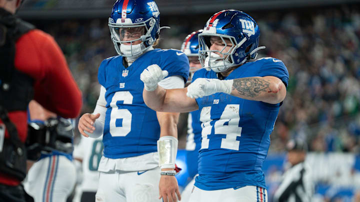 New York Giants running back Cam Skattebo (44) and New York Giants quarterback Jaxson Dart (6) celebrate after a touchdown during a Thursday Night Football game between the New York Giants and the Philadelphia Eagles at MetLife Stadium in East Rutherford on Oct. 9, 2025.
