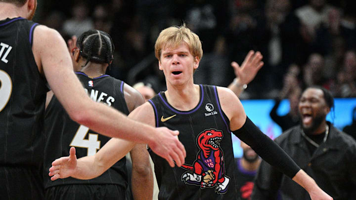 Nov 21, 2024; Toronto, Ontario, CAN;  Toronto Raptors forward Gradey Dick (1) celebrates with team mates after scoring a basket against the Minnesota Timberwolves in the second half at Scotiabank Arena. Mandatory Credit: Dan Hamilton-Imagn Images