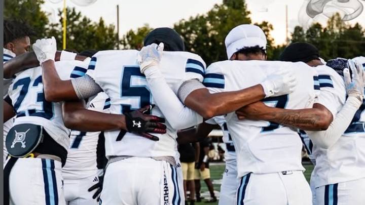 The Dorman football team huddle up prior to game. The Dorman football team huddle up prior to game.