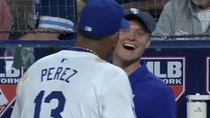 Kansas City Royals catcher/first baseman Salvador Perez jokes with a cameraman after attempting to catch a foul ball during the top of the eighth inning of Monday's 4-2 loss to the New York Yankees at Kauffman Stadium. 