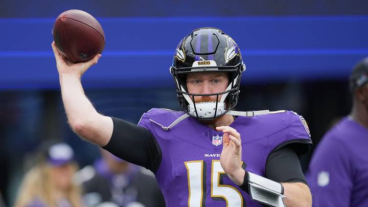 Oct 12, 2025; Baltimore, Maryland, USA; Baltimore Ravens quarterback Cooper Rush (15) warms up prior to the game against the Los Angeles Rams at M&T Bank Stadium. Mandatory Credit: Mitch Stringer-Imagn Images