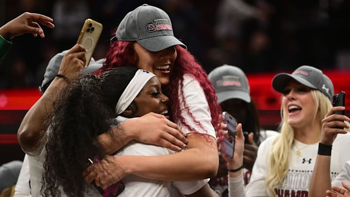South Carolina basketball post player Kamilla Cardoso with guard Raven Johnson and forward Chloe Kitts