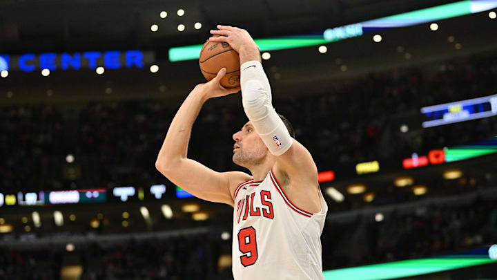 Jan 18, 2026; Chicago, Illinois, USA; Chicago Bulls center Nikola Vucevic (9) makes a three point shot against the Brooklyn Nets during the first half at United Center. Mandatory Credit: Patrick Gorski-Imagn Images Jan 18, 2026; Chicago, Illinois, USA; Chicago Bulls center Nikola Vucevic (9) makes a three point shot against the Brooklyn Nets during the first half at United Center. Mandatory Credit: Patrick Gorski-Imagn Images