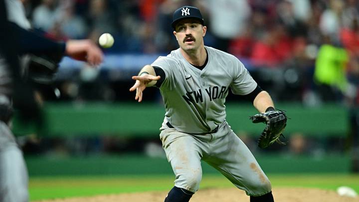 Oct 17, 2024; Cleveland, Ohio, USA; New York Yankees third baseman Jon Berti (19) tosses to first during the sixth inning against the Cleveland Guardians in game 3 of the American League Championship Series at Progressive Field. Mandatory Credit: David Dermer-Imagn Images Oct 17, 2024; Cleveland, Ohio, USA; New York Yankees third baseman Jon Berti (19) tosses to first during the sixth inning against the Cleveland Guardians in game 3 of the American League Championship Series at Progressive Field. Mandatory Credit: David Dermer-Imagn Images