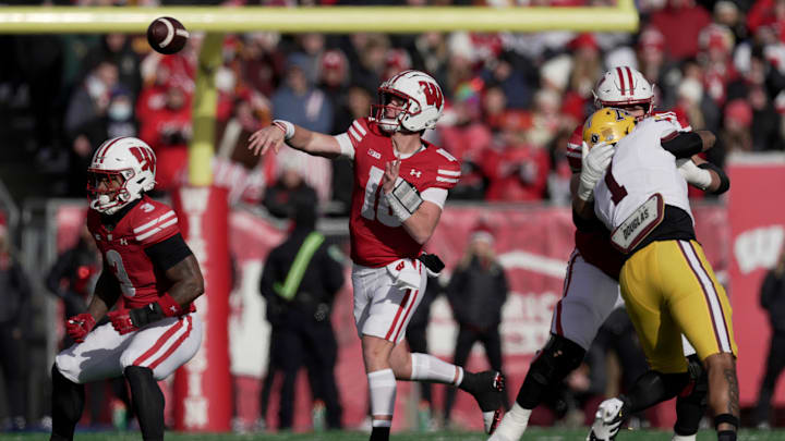 Wisconsin quarterback Braedyn Locke (18) throws a pass during the first quarter of their game at Camp Randall Stadium Friday, November 29, 2024 in Madison, Wisconsin. Minnesota beat Wisconsin 24-7.