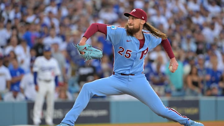 Oct 9, 2025; Los Angeles, California, USA; Philadelphia Phillies pitcher Matt Strahm (25) throws in the ninth inning against the Los Angeles Dodgers during game four of the NLDS round for the 2025 MLB playoffs at Dodger Stadium. Mandatory Credit: Jayne Kamin-Oncea-Imagn Images