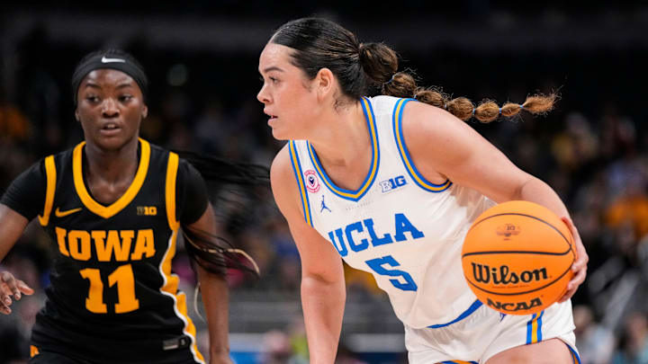 UCLA Bruins guard Charlisse Leger-Walker (5) rushes up the court Sunday, March 8, 2026, during the Big Ten Tournament Championship game at Gainbridge Fieldhouse in Indianapolis.