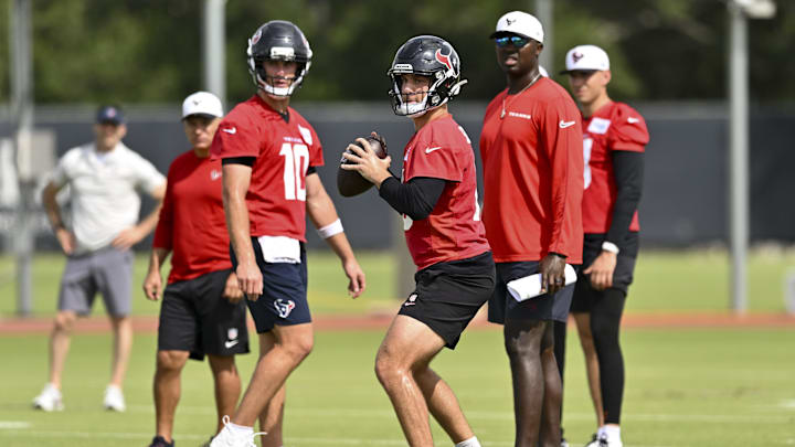 Jun 10, 2025; Houston, TX, USA; Houston Texans quarterback Kedon Slovis (16) participates in a drill during an NFL football minicamp at NRG Stadium. Mandatory Credit: Maria Lysaker-Imagn Images 